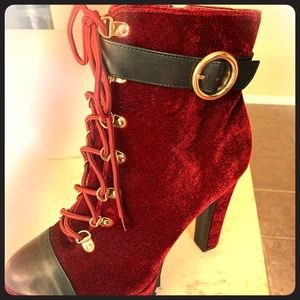 Red Velvet boots with a black buckle sz 11